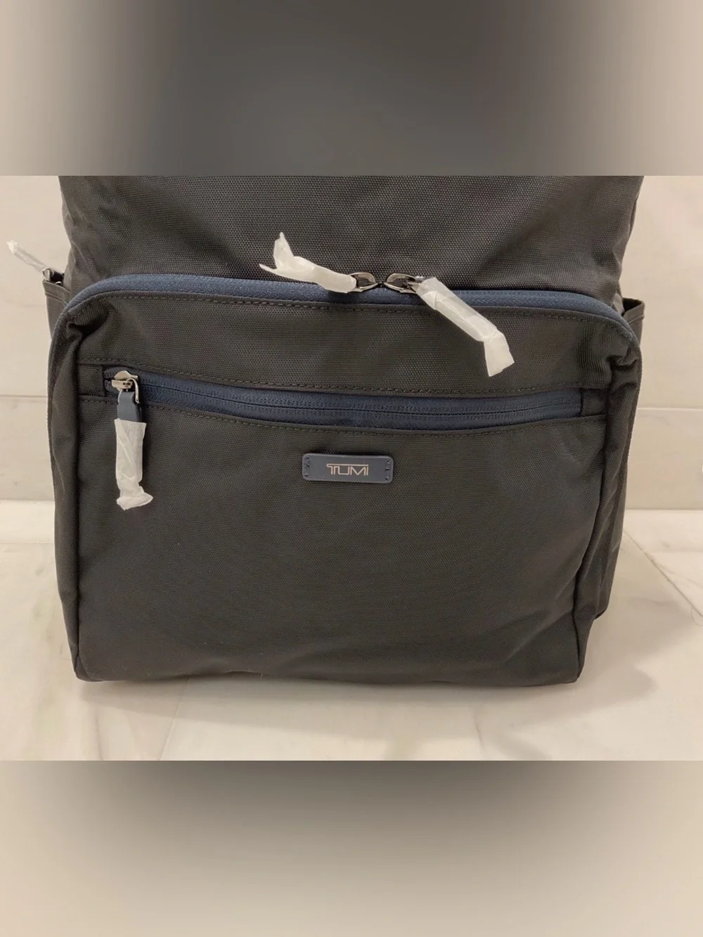 Tumi up sale